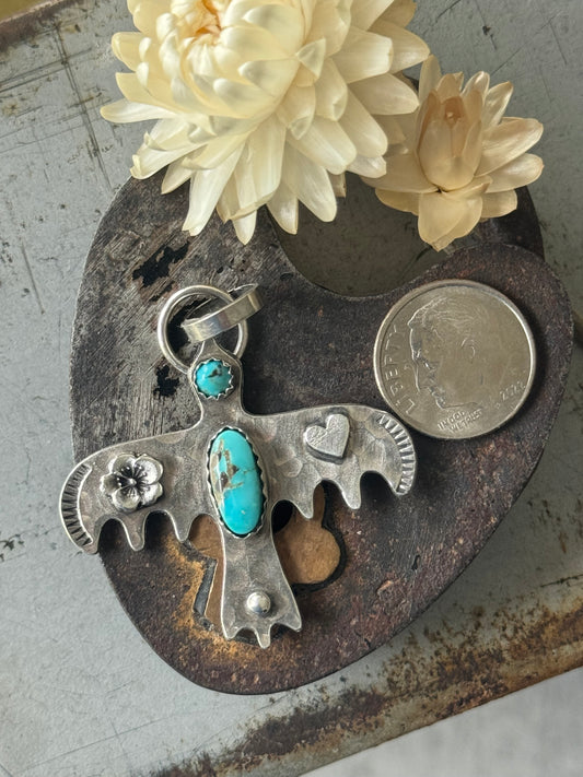 Lone Mountain Turquoise sterling bird pendant