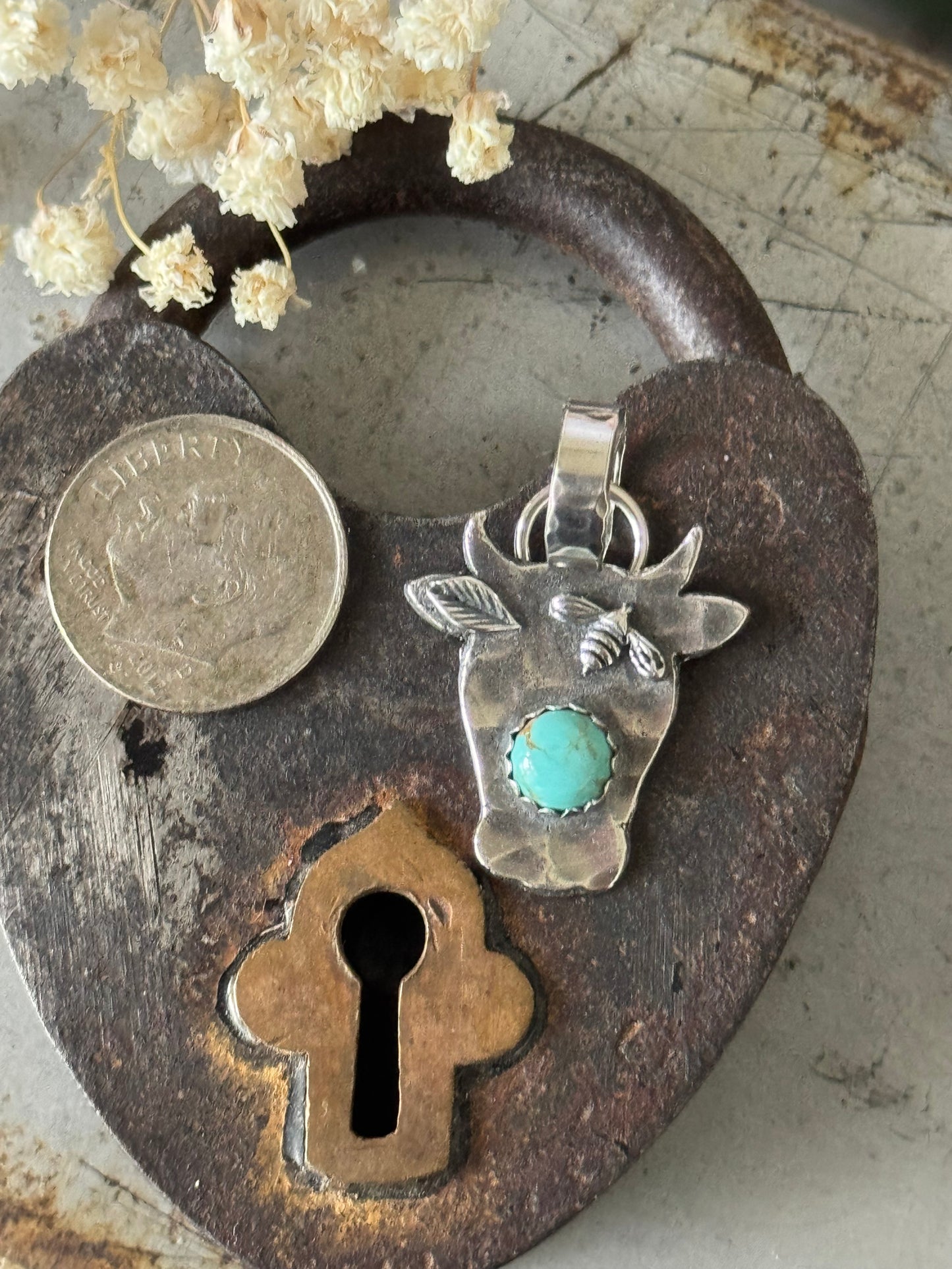 Sterling cow pendant with high grade Number 8 Turquoise