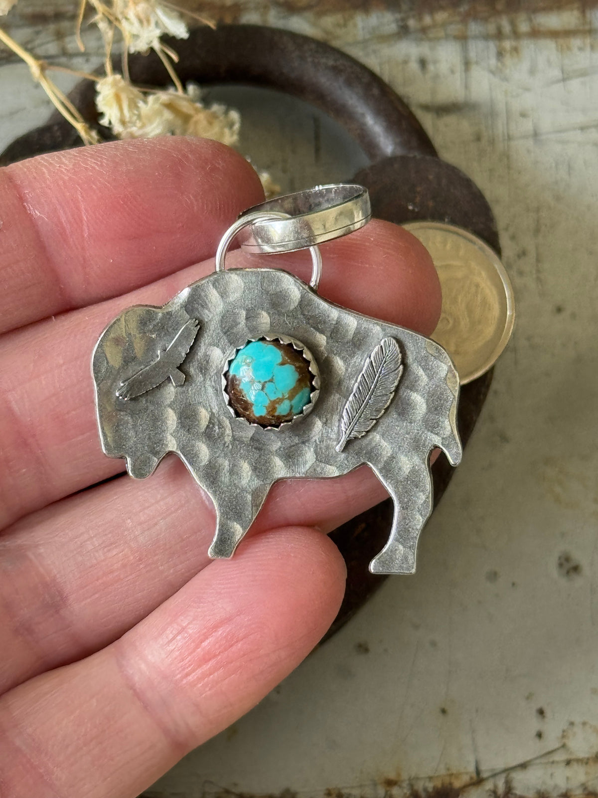 Bison sterling pendant with Number 8 Turquoise
