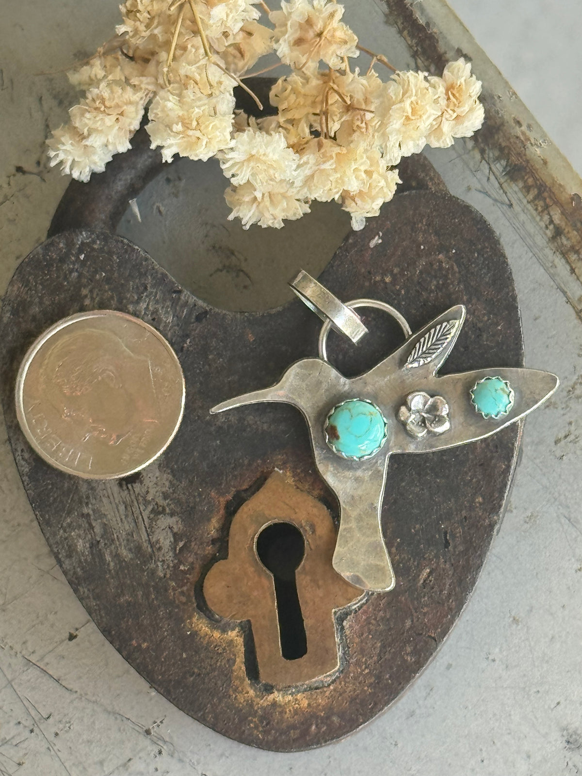 Hummingbird sterling pendant with Number 8 Turquoise