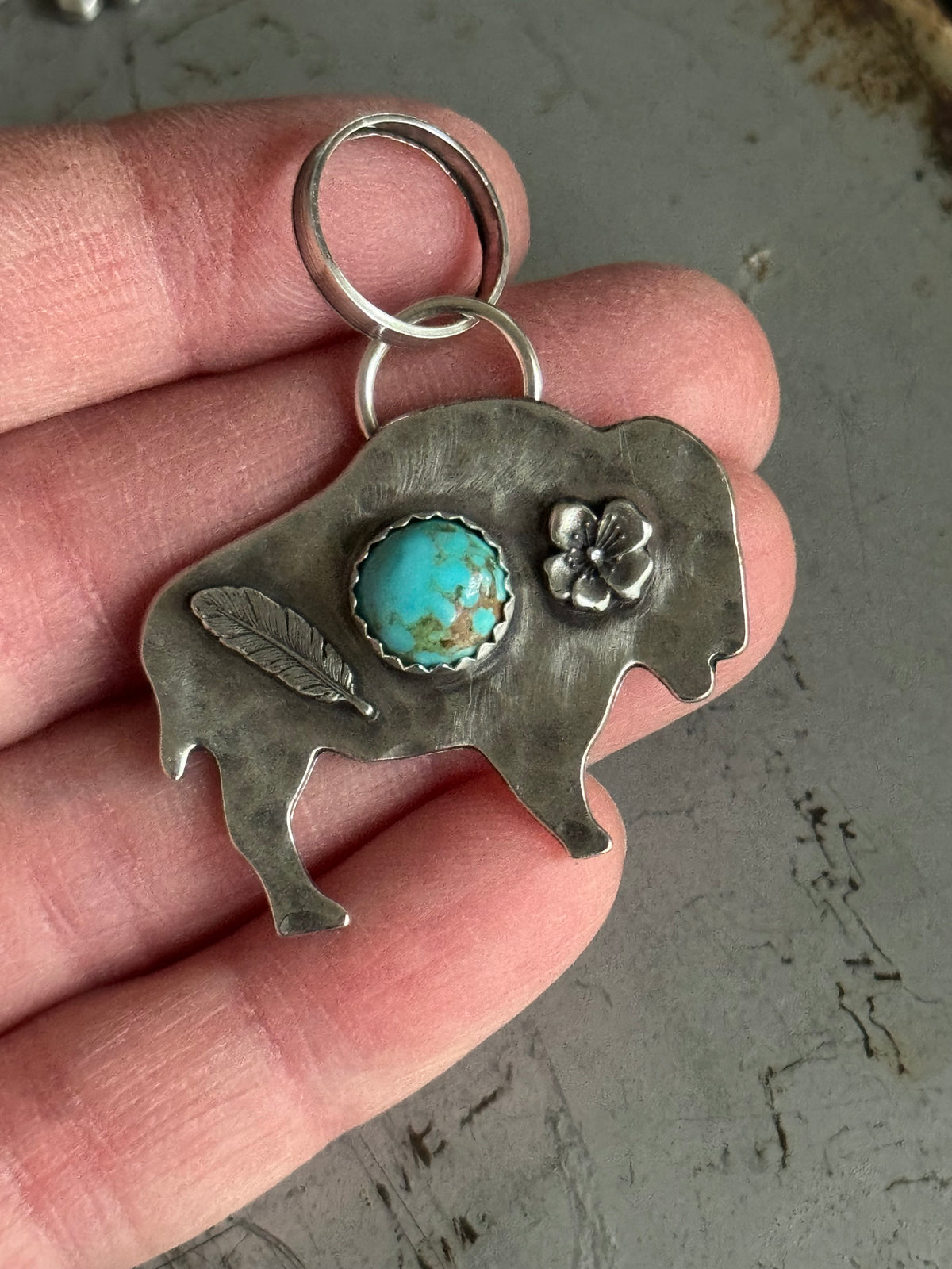 Bison sterling pendant with Number 8 Turquoise