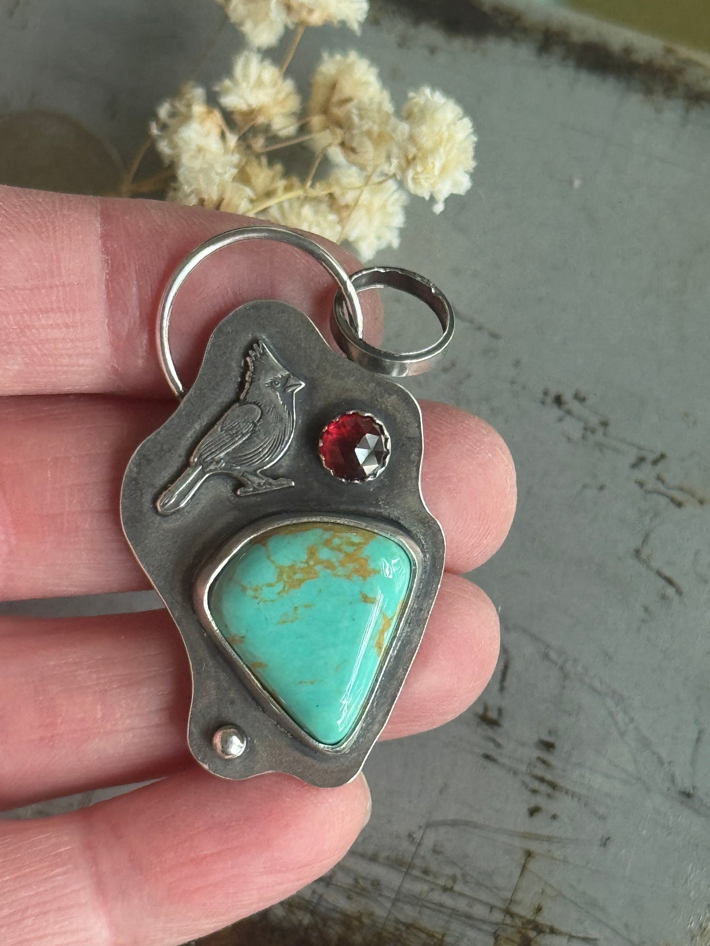 Cardinal sterling pendant with Tyrone Turquoise and Garnet accent
