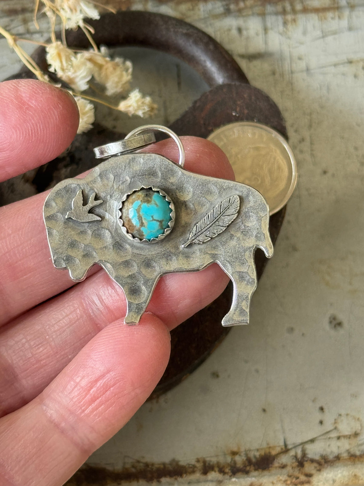 Bison sterling pendant with Number 8 Turquoise