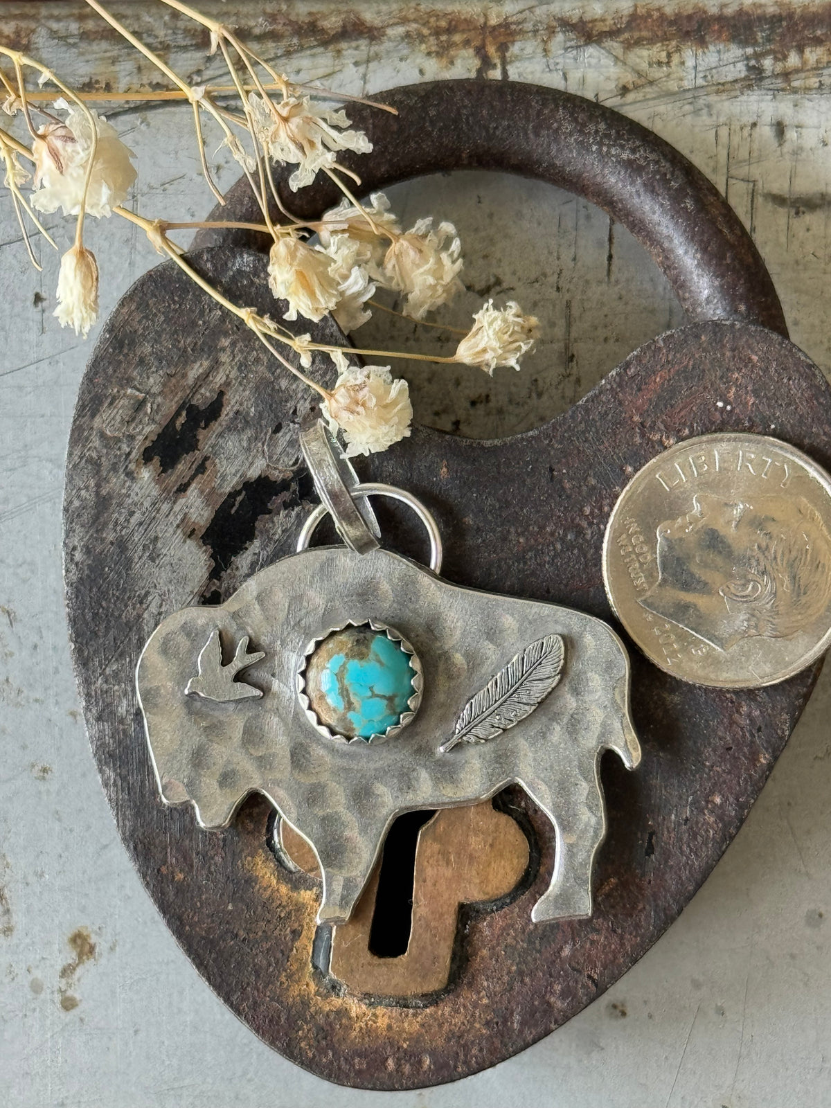 Bison sterling pendant with Number 8 Turquoise