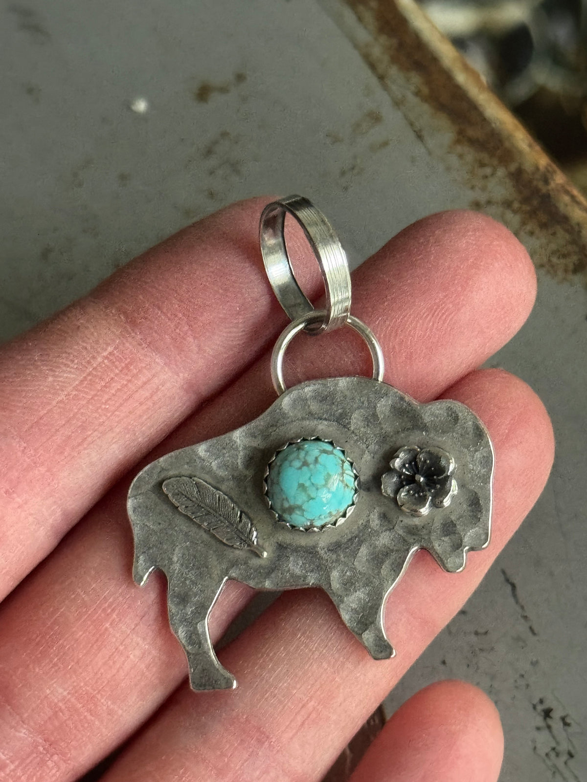 Bison sterling pendant with Number 8 Turquoise