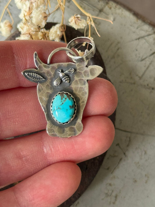 Lone Mountain Turquoise sterling cow pendant