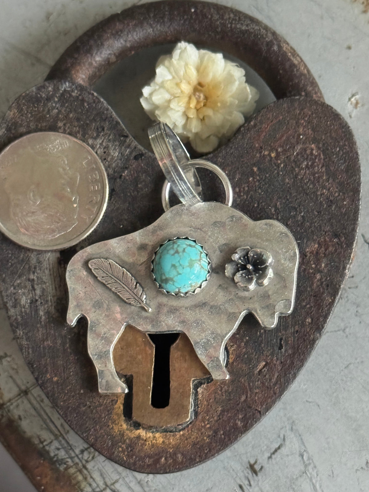 Bison sterling pendant with Number 8 Turquoise