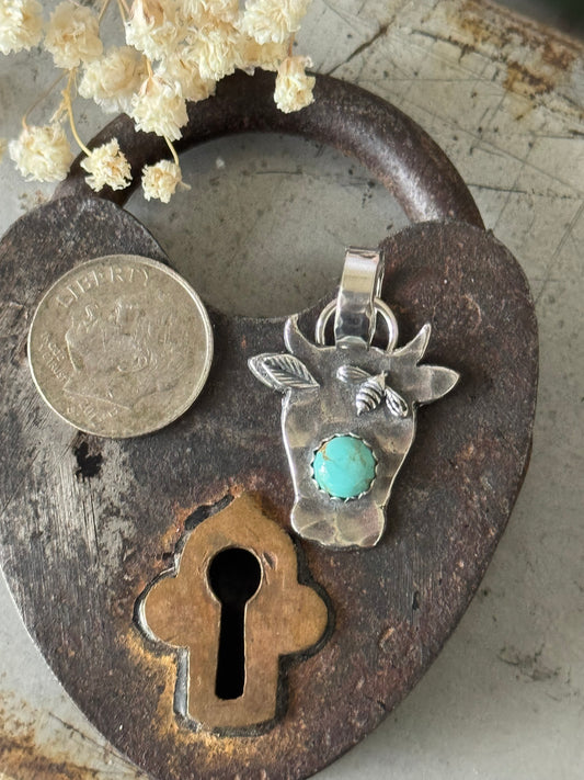 Sterling cow pendant with high grade Number 8 Turquoise