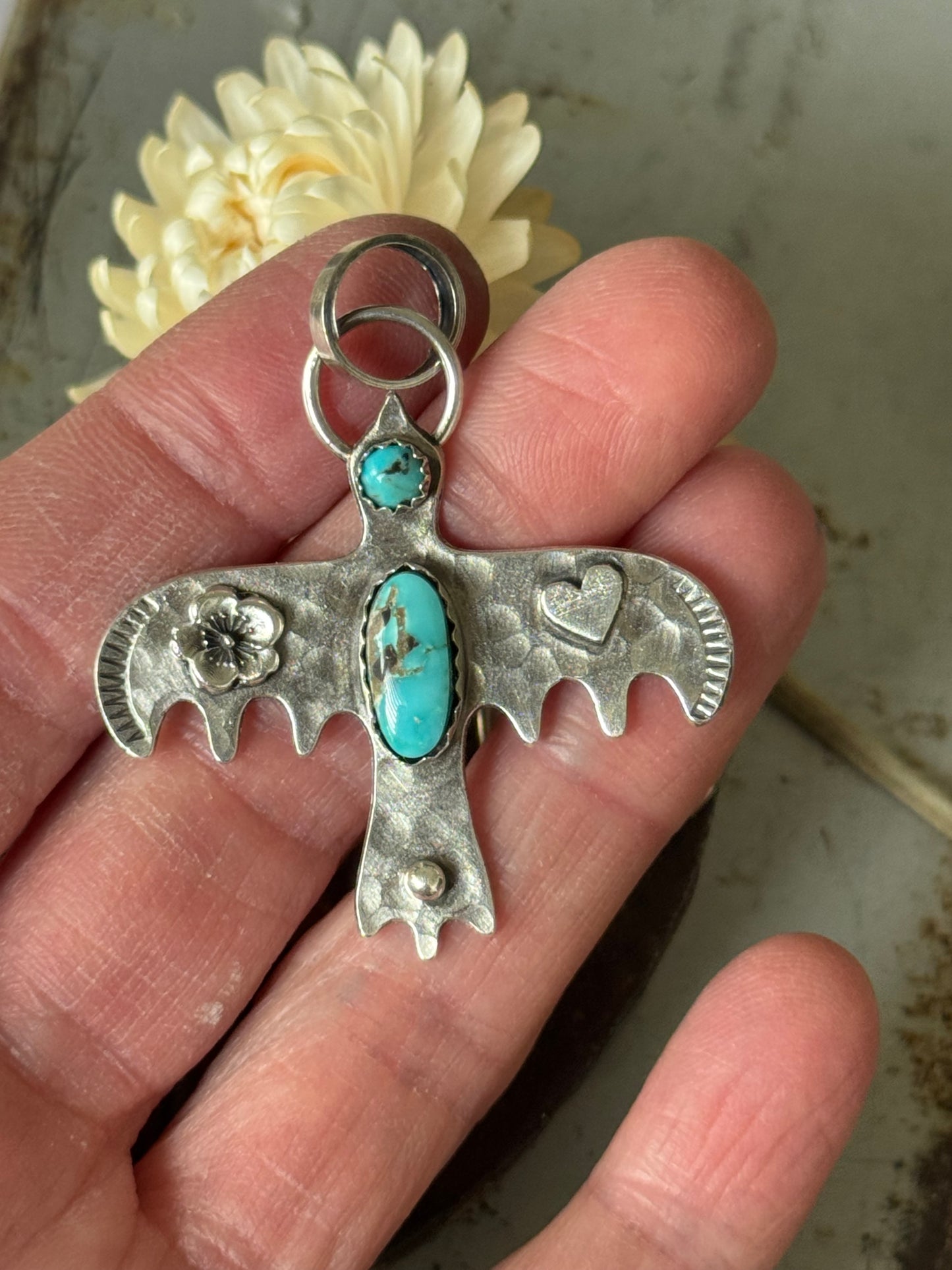 Lone Mountain Turquoise sterling bird pendant