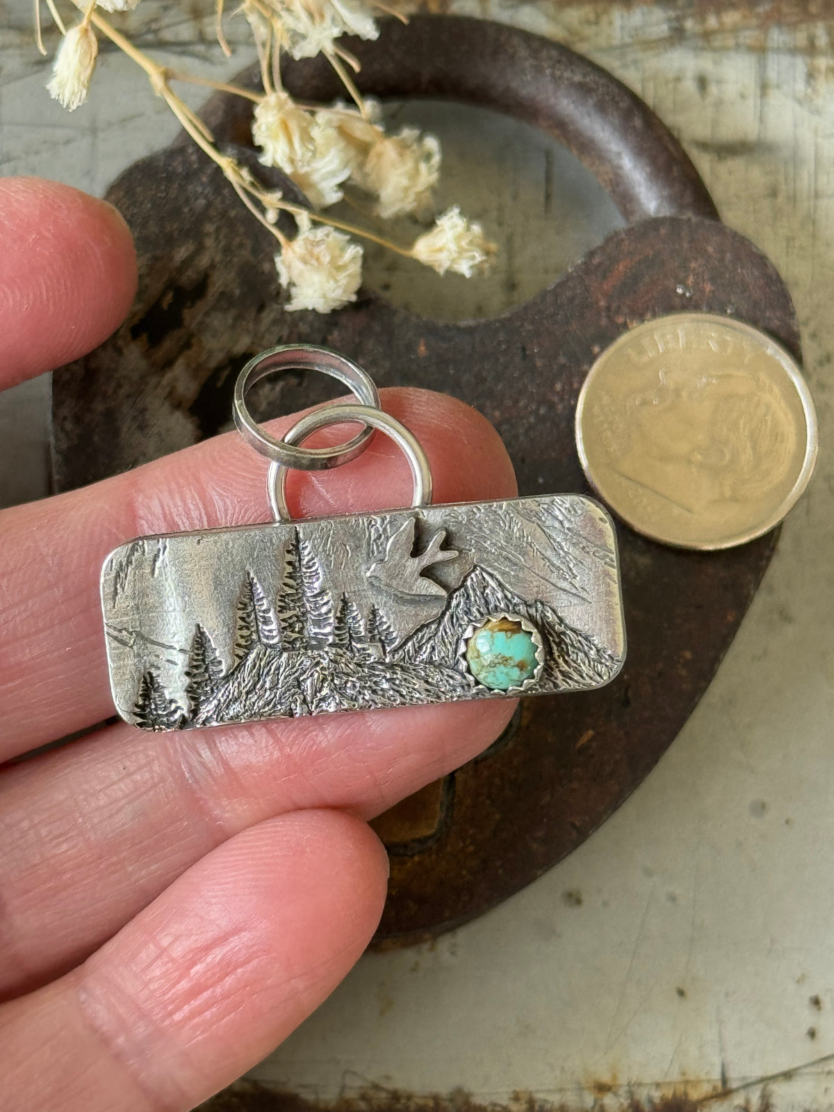 Mountain sterling pendant with Number 8 Turquoise