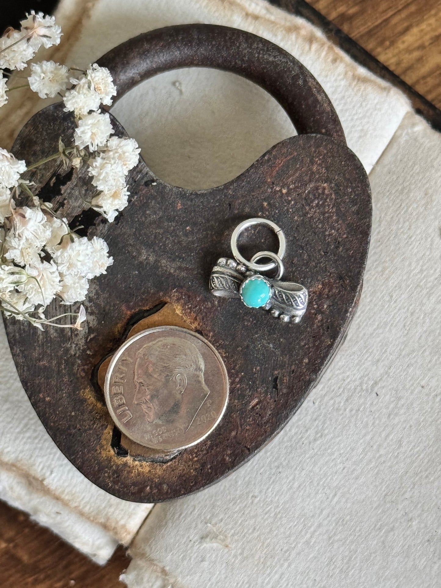 Sterling bow charm with Lone Mountain Turquoise